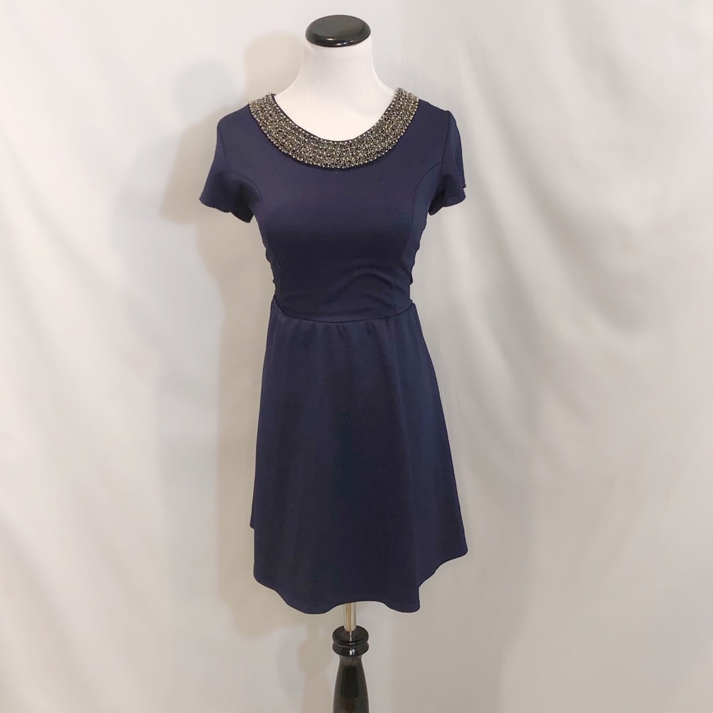 Blue statement necklace skater style short dress
